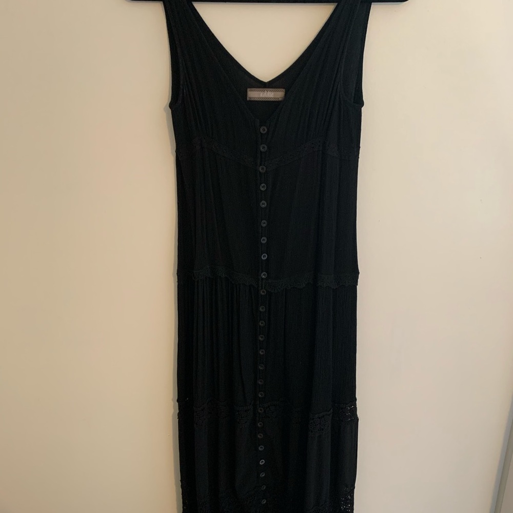 Black sleeveless duster dress